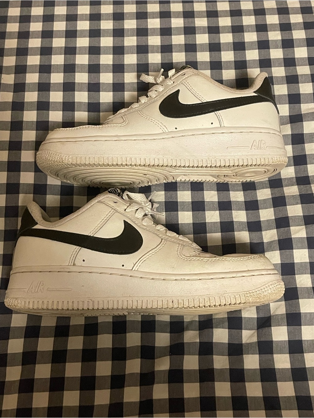 Nike White Low-Top Sneakers with Black Swoosh
